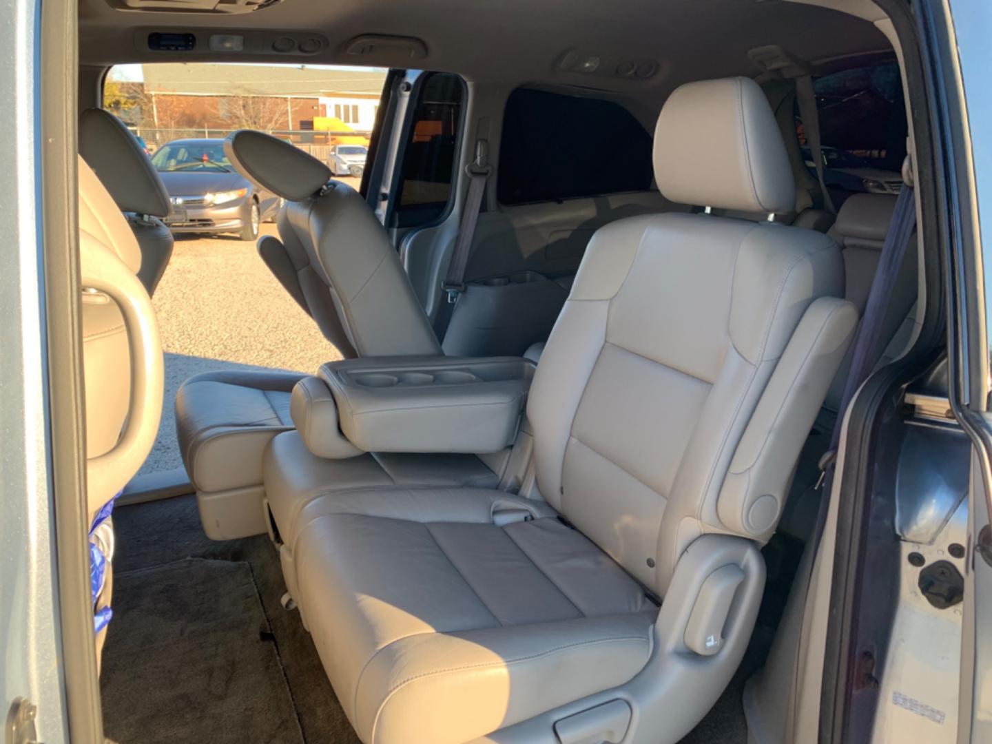 2012 Blue /gray Honda Odyssey Touring (5FNRL5H94CB) with an 3.7L L5 DOHC 20V engine, AUTOMATIC transmission, located at 1830 North Belt Line Road, Irving, TX, 75061, (469) 524-0199, 32.834373, -96.993584 - Photo#8